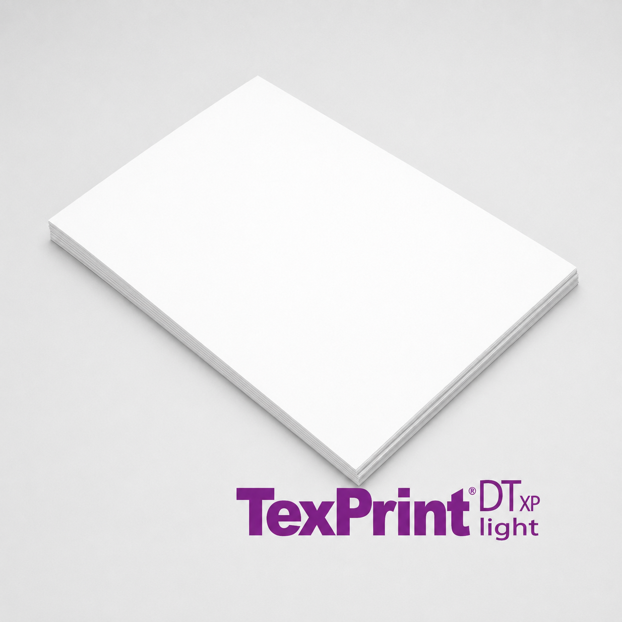 TexPrint DT-HP Light A4 sublimācijas papīrs uz gaiši pelēka studijas fona
